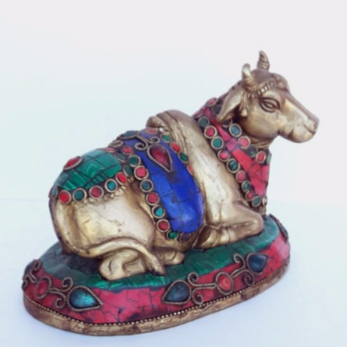 Brass cow with gems stone inlay