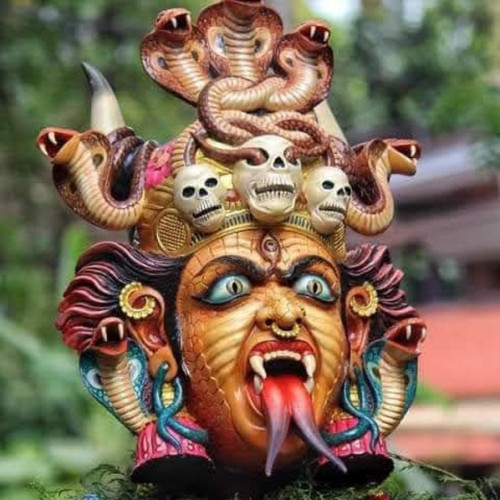 White wood Kummattikali face mask 32 inch for wall hanging with special color used the art work created by Ramachandran